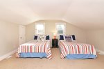 Upstairs bedroom with two queen beds
